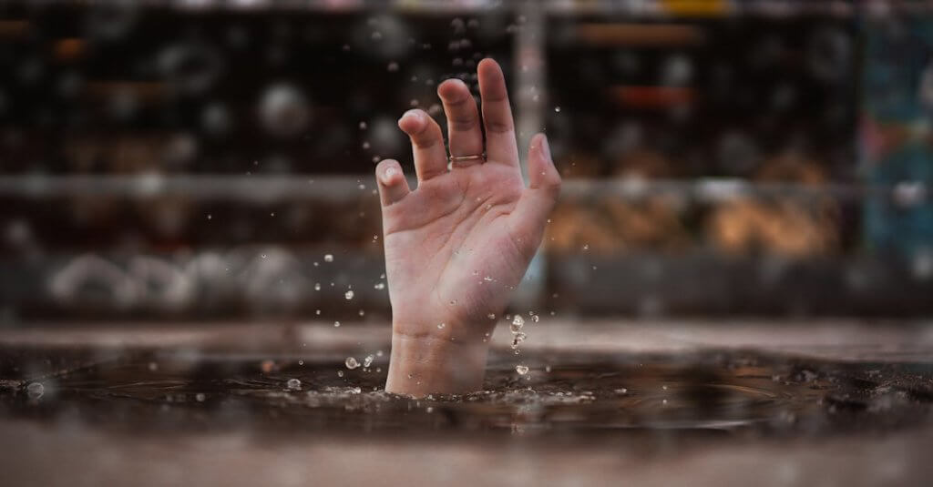 Person Drowning in Water